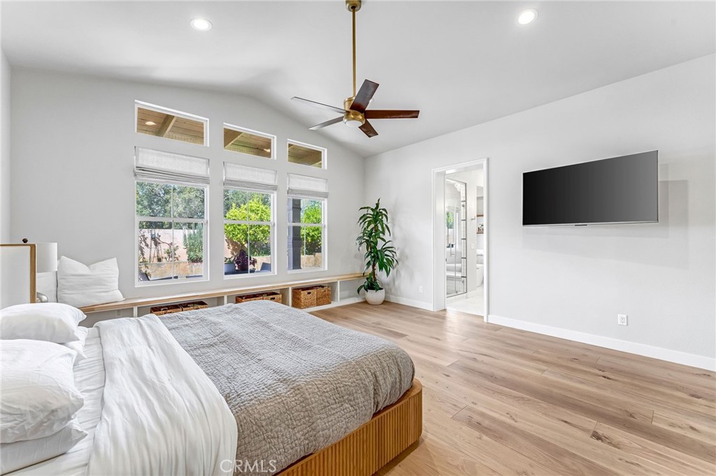 2269 Shady Oaks Road Glendora, CA 91741 - Photo 37 of 62 a spacious bedroom with a large bed and a flat screen tv