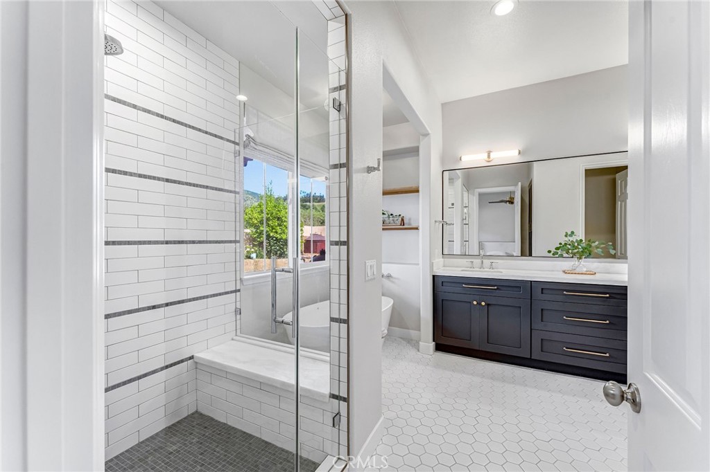 2269 Shady Oaks Road Glendora, CA 91741 - Photo 38 of 62 a bathroom with a tub sink and mirror