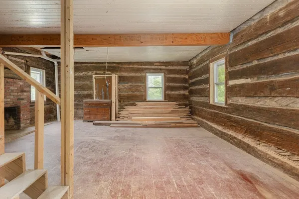 a bathroom with a shower and a sink