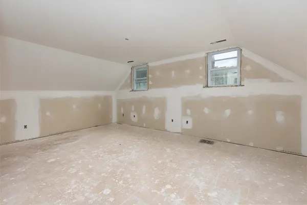 a view of walk in closet with window