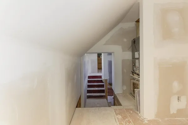 a view of balcony with wooden floor and fence
