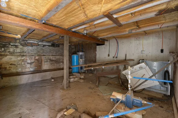 a view of a cafe with sitting area and floor to ceiling window