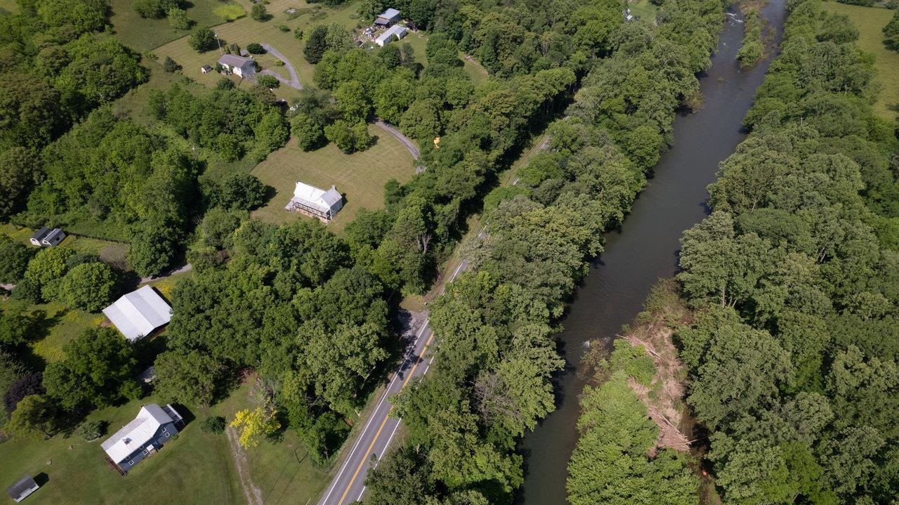 13573 Cooley Spring Lane Broadway, VA 22815 - Photo 43 of 63 an aerial view of a house with a yard