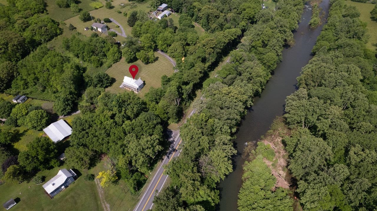13573 Cooley Spring Lane Broadway, VA 22815 - Photo 44 of 63 an aerial view of residential house with outdoor space and trees all around