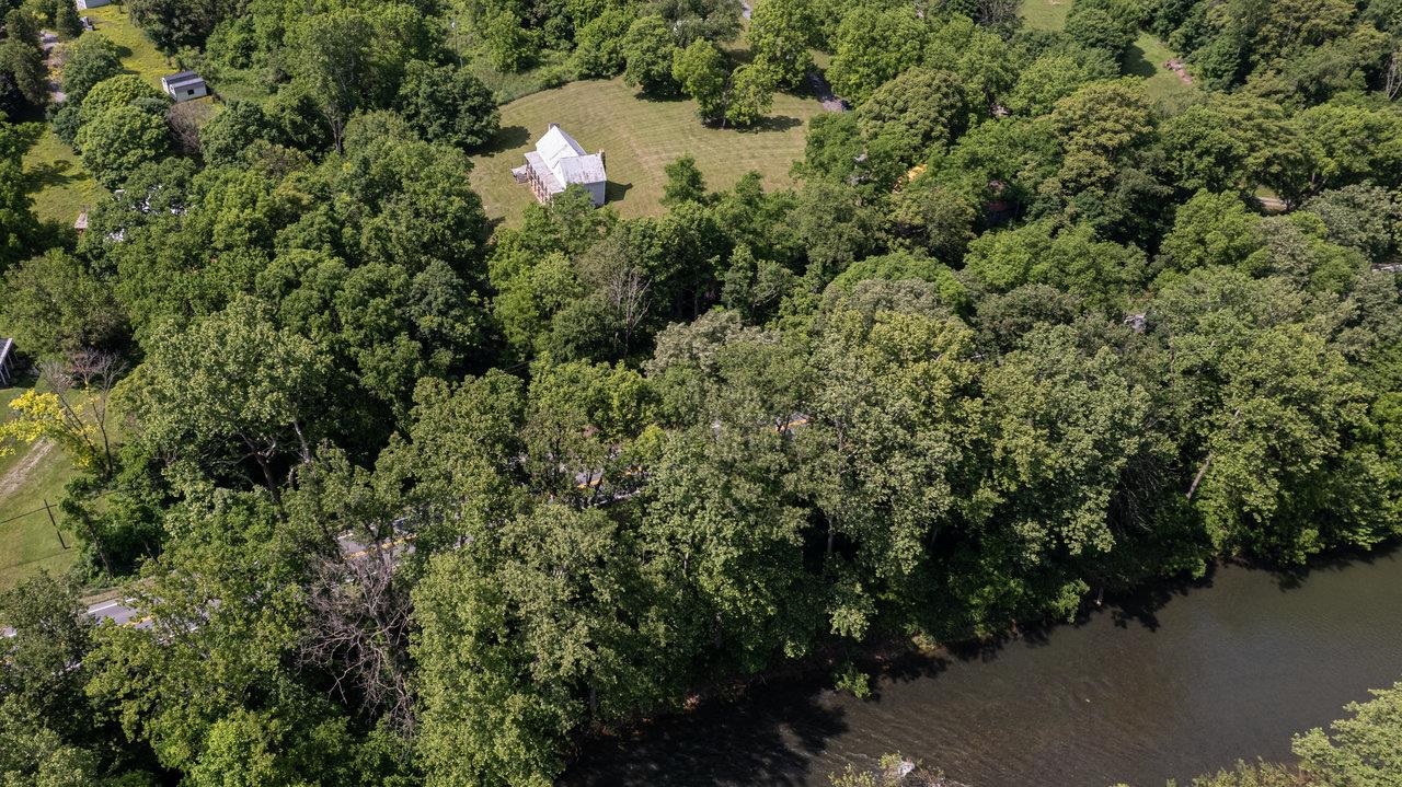 13573 Cooley Spring Lane Broadway, VA 22815 - Photo 49 of 63 an aerial view of a house with a yard and outdoor seating