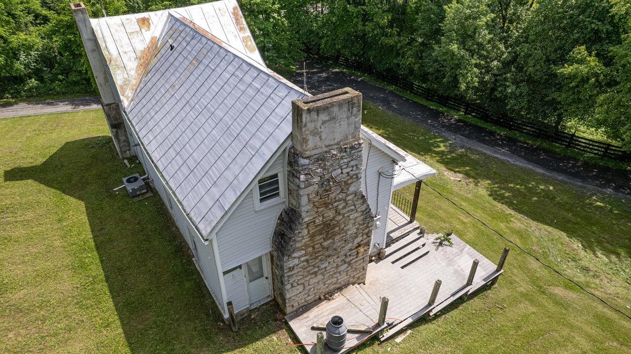 13573 Cooley Spring Lane Broadway, VA 22815 - Photo 58 of 63 a view of a house with a yard