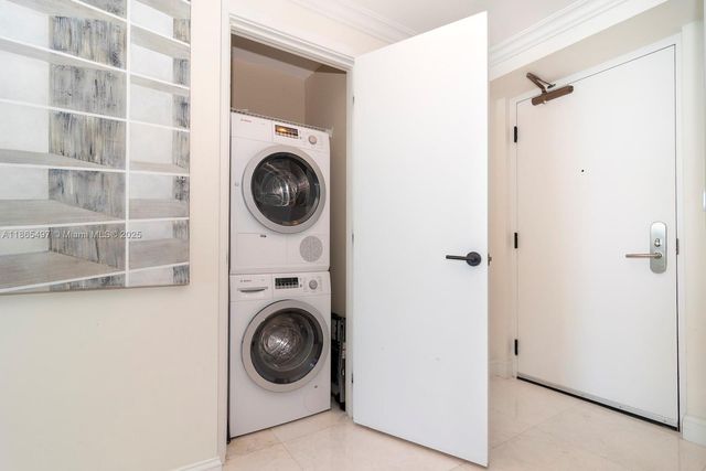 a view of washer and dryer in a utility room