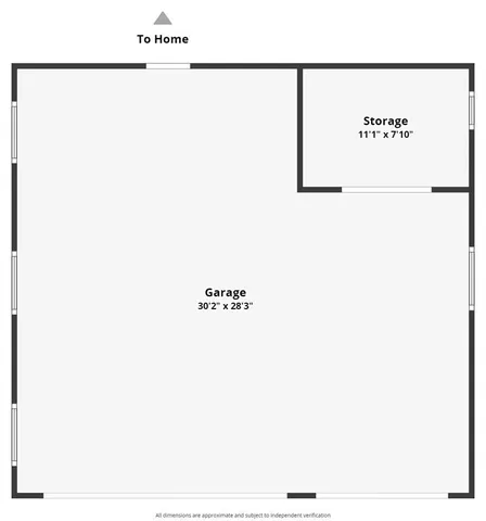 a living room with furniture fireplace and a large window