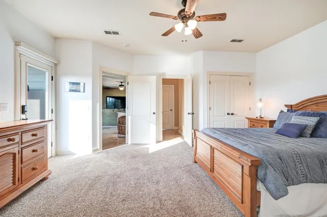 a view of a balcony with wooden floor