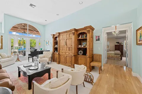 a bathroom with a sink mirror and vanity