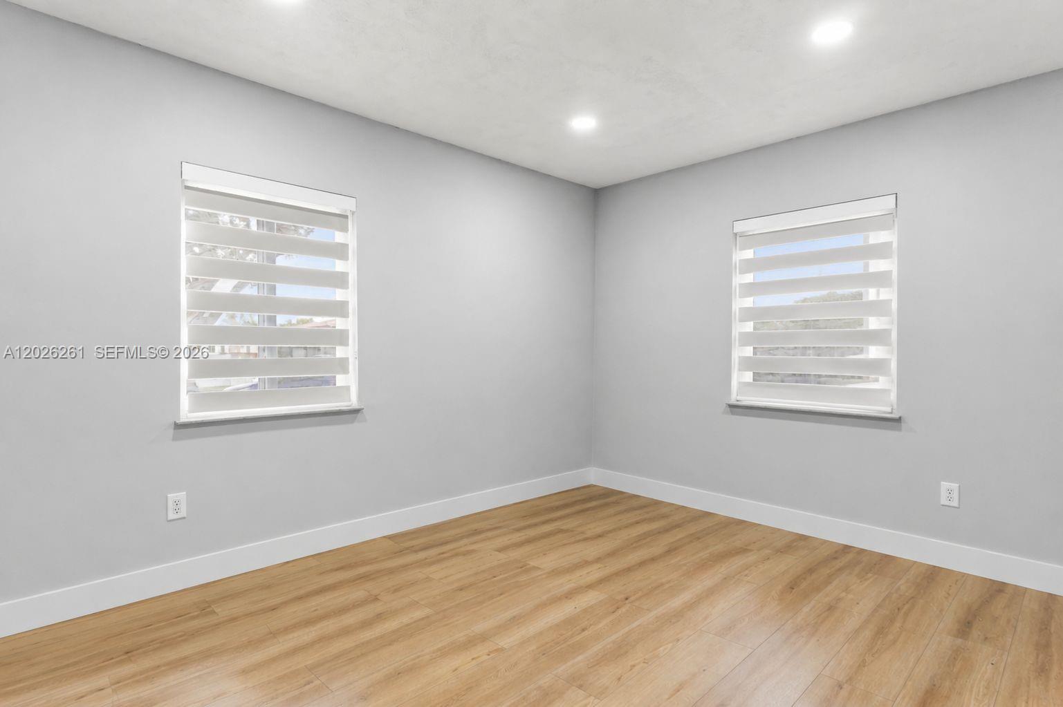 6250 Southwest 20th Terrace Miami, FL 33155 - Photo 16 of 42 a view of empty room with wooden floor