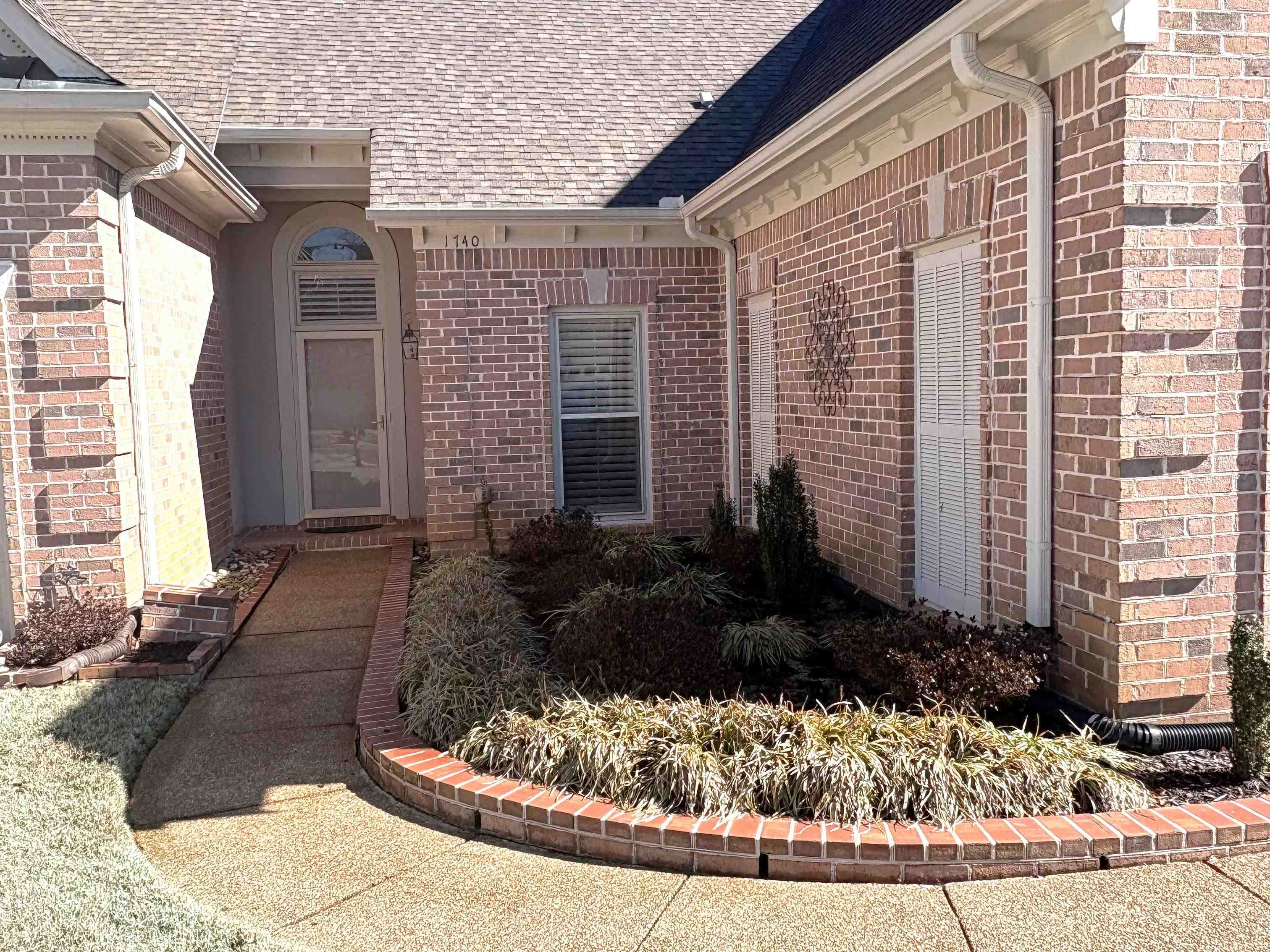 1740 Constable Court Collierville, TN 38017 - Photo 2 of 17 Property entrance with brick siding.