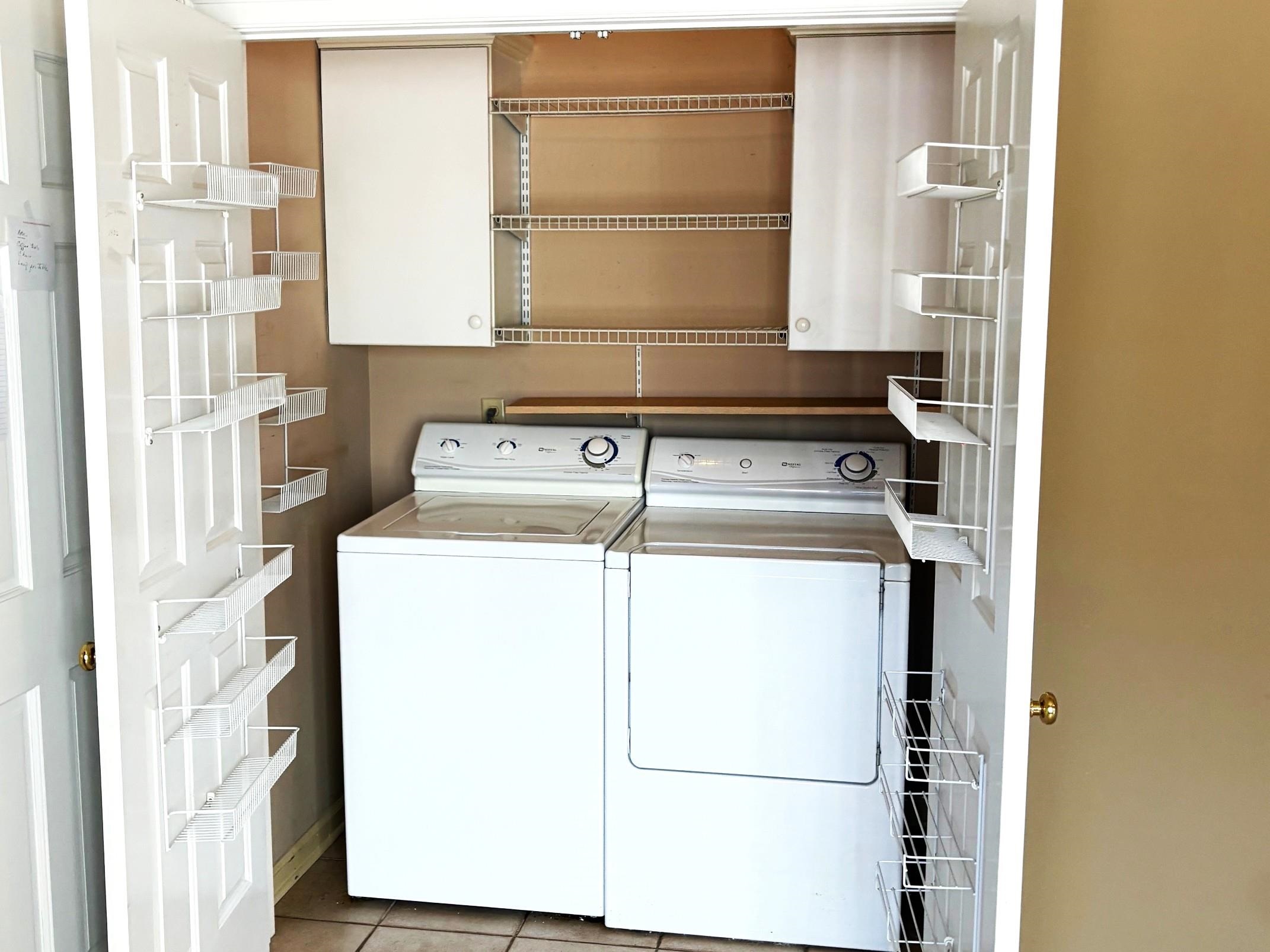 1740 Constable Court Collierville, TN 38017 - Photo 7 of 17 Laundry and cabinet space.