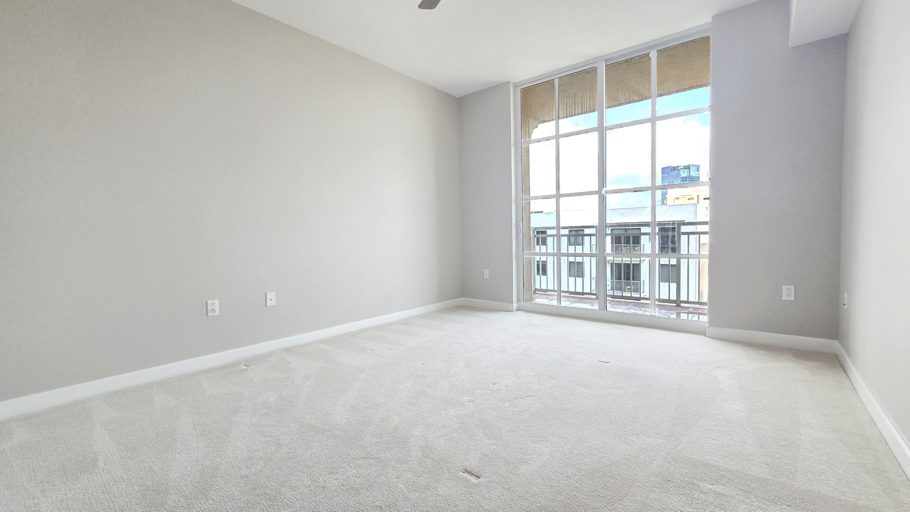 410 Evernia Street, Unit 701 West Palm Beach, FL 33401 - Photo 13 of 29 an empty room with a window