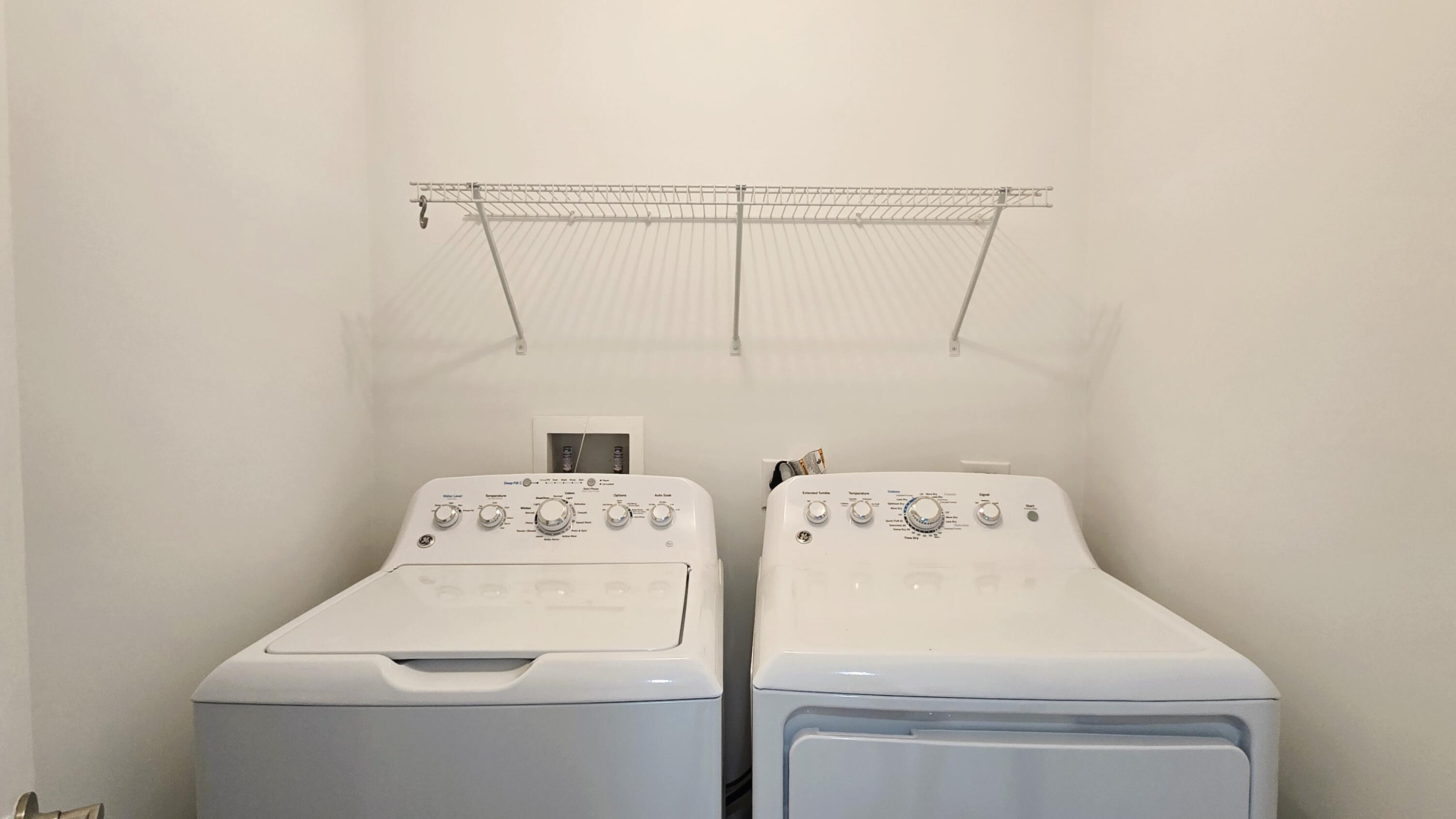 410 Evernia Street, Unit 701 West Palm Beach, FL 33401 - Photo 18 of 29 a utility room with dryer and washer