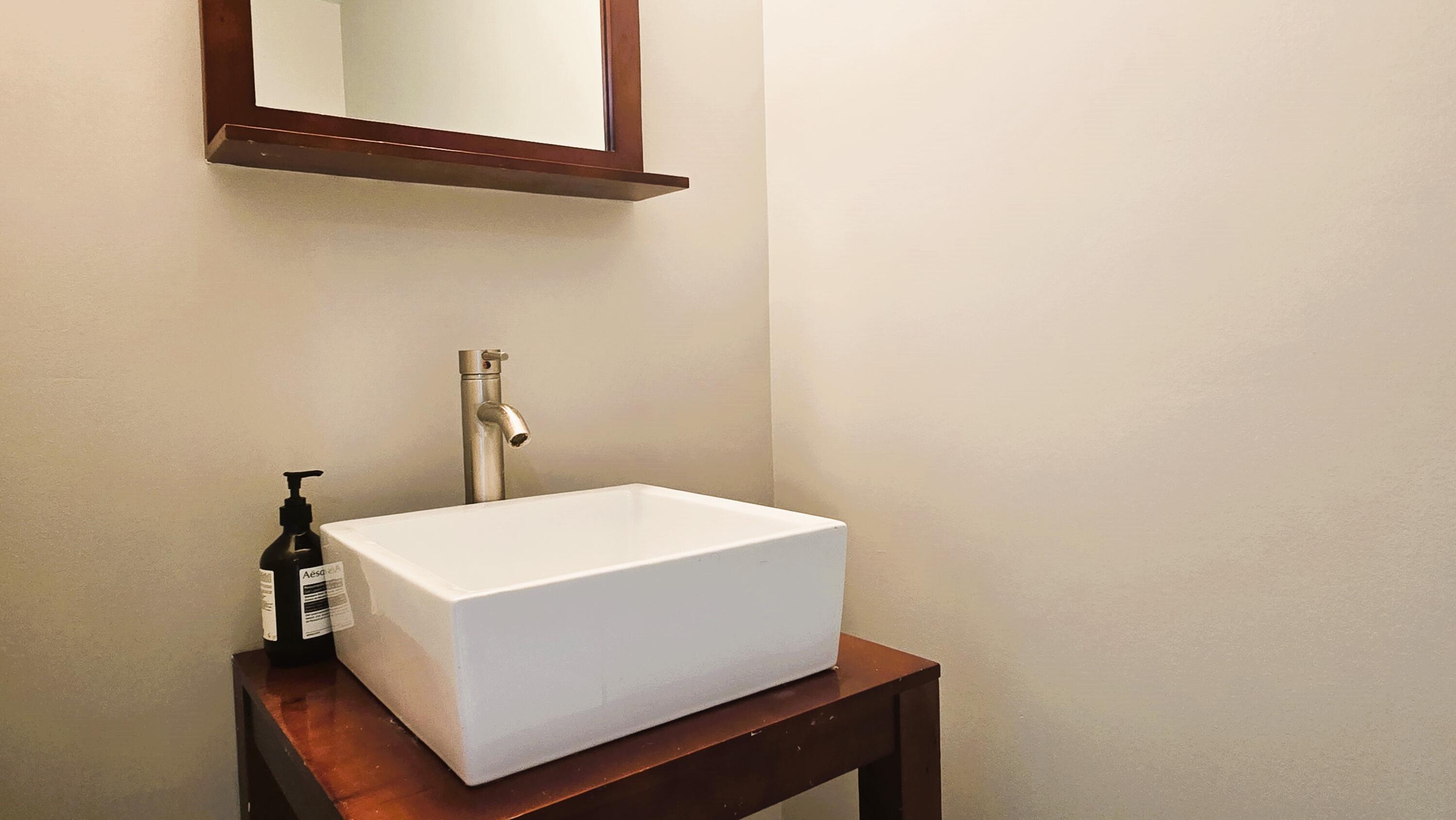 410 Evernia Street, Unit 701 West Palm Beach, FL 33401 - Photo 19 of 29 a utility room with a sink