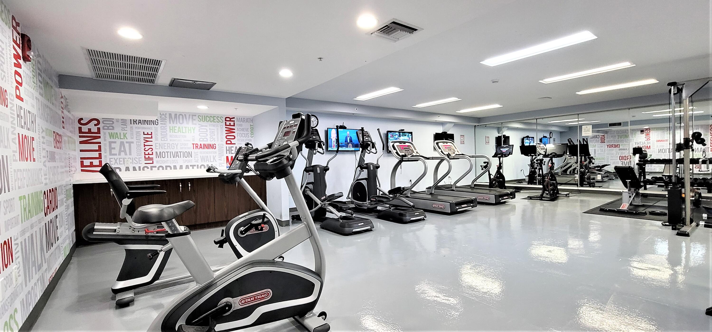 410 Evernia Street, Unit 701 West Palm Beach, FL 33401 - Photo 23 of 29 a view of a room with gym equipment