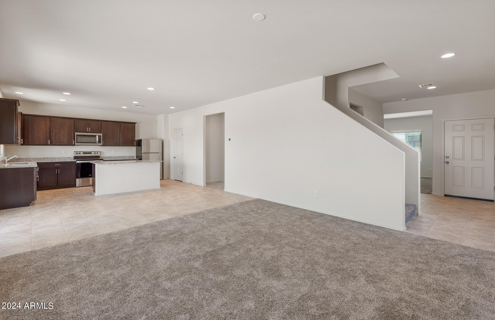 25155 West Romley Road Buckeye, AZ 85326 - Photo 6 of 21 5 - Kitchen and Gathering Room