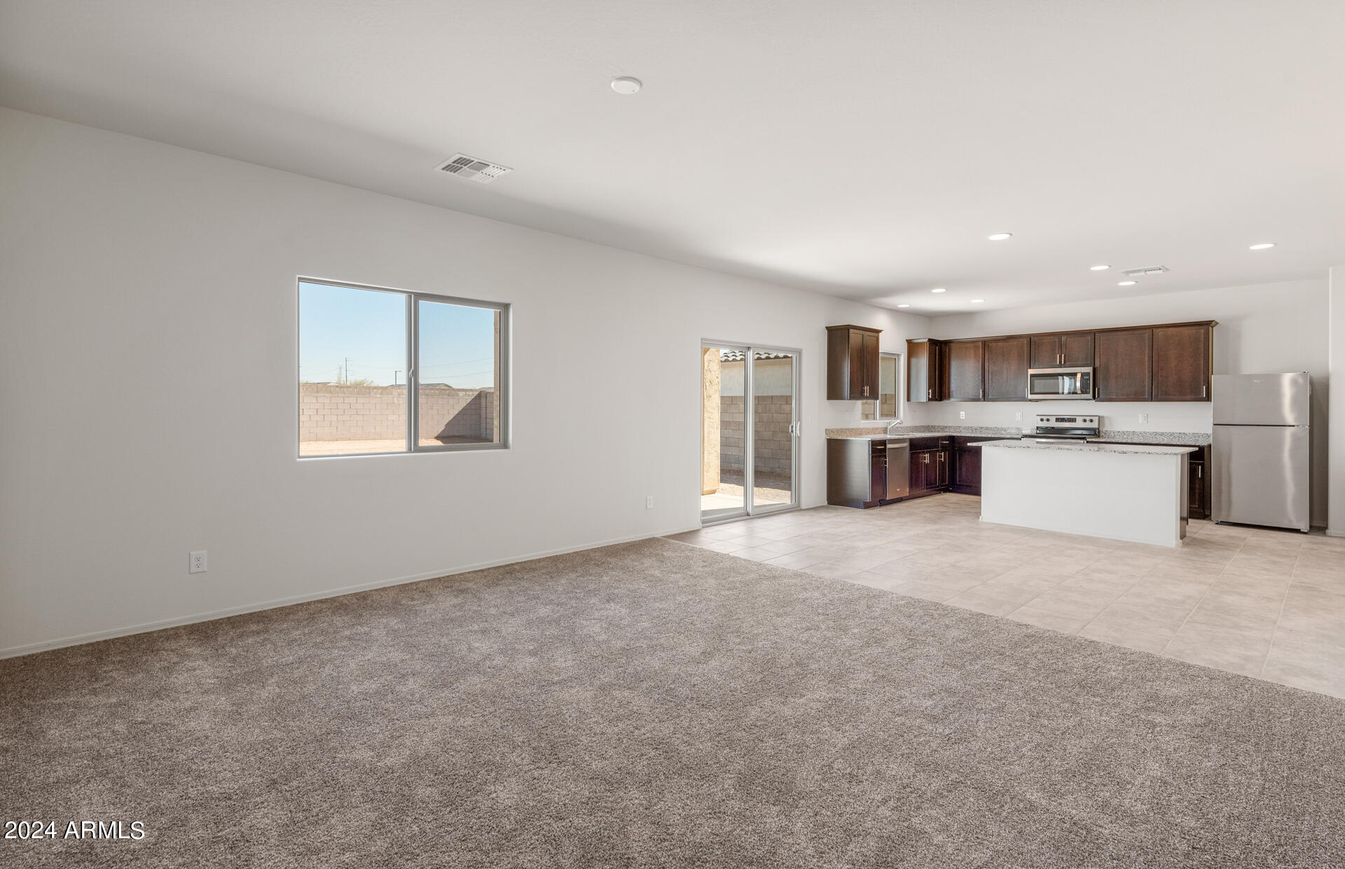 25155 West Romley Road Buckeye, AZ 85326 - Photo 8 of 21 7 - Gathering Room and Kitchen
