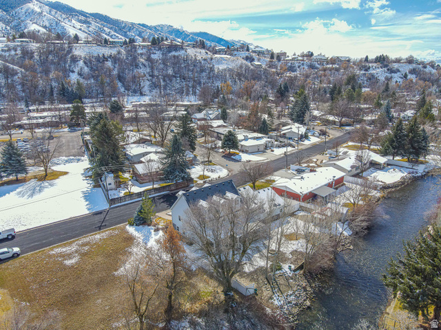 1045 Fox Farm Road Logan, UT 84321 - Photo 5 of 65 Snowy aerial view featuring a mountain view