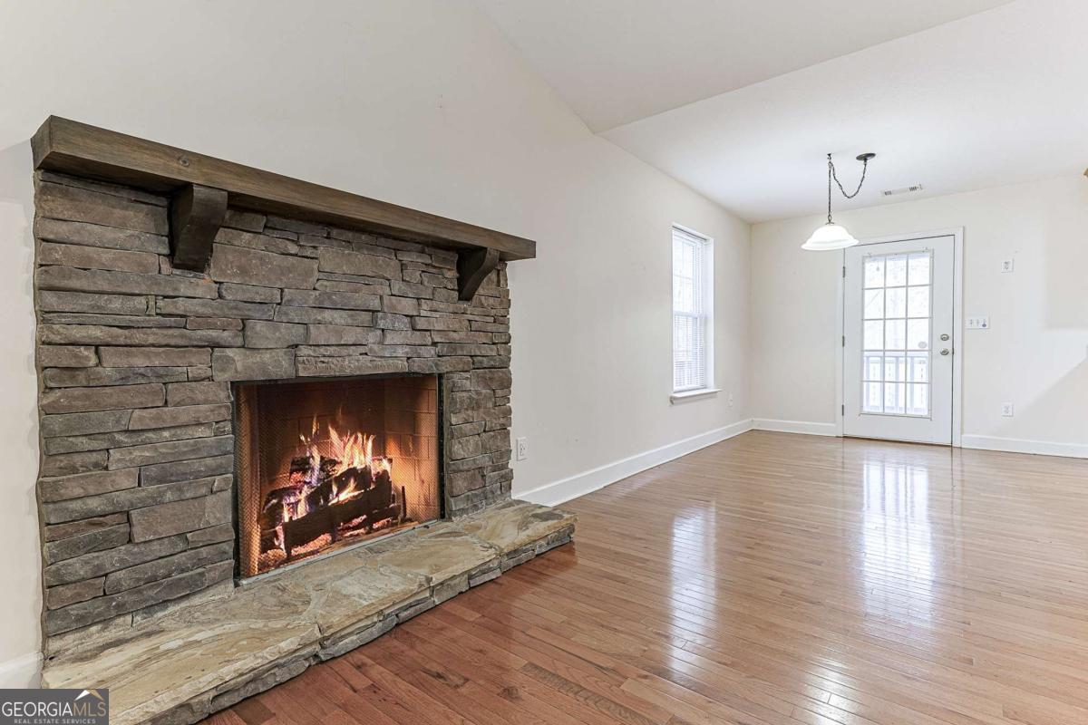 30 Chancel Circle, Unit 654R Ellijay, GA 30540 - Photo 11 of 44 a living room with furniture and a fireplace