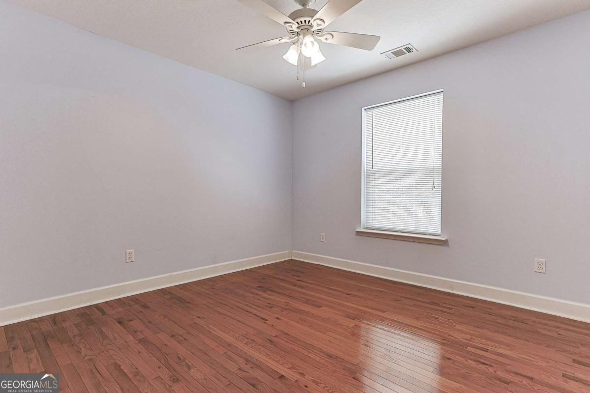 30 Chancel Circle, Unit 654R Ellijay, GA 30540 - Photo 29 of 44 wooden floor in an empty room with a window