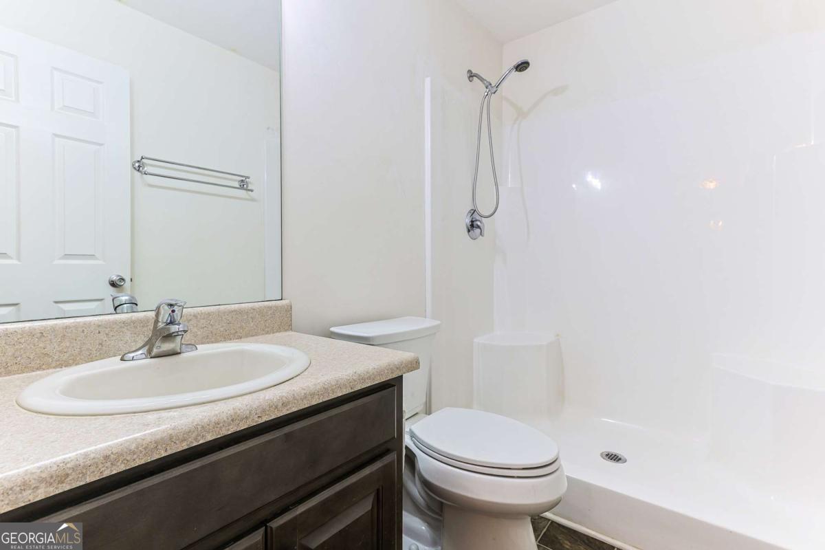 30 Chancel Circle, Unit 654R Ellijay, GA 30540 - Photo 30 of 44 a bathroom with a sink toilet and shower