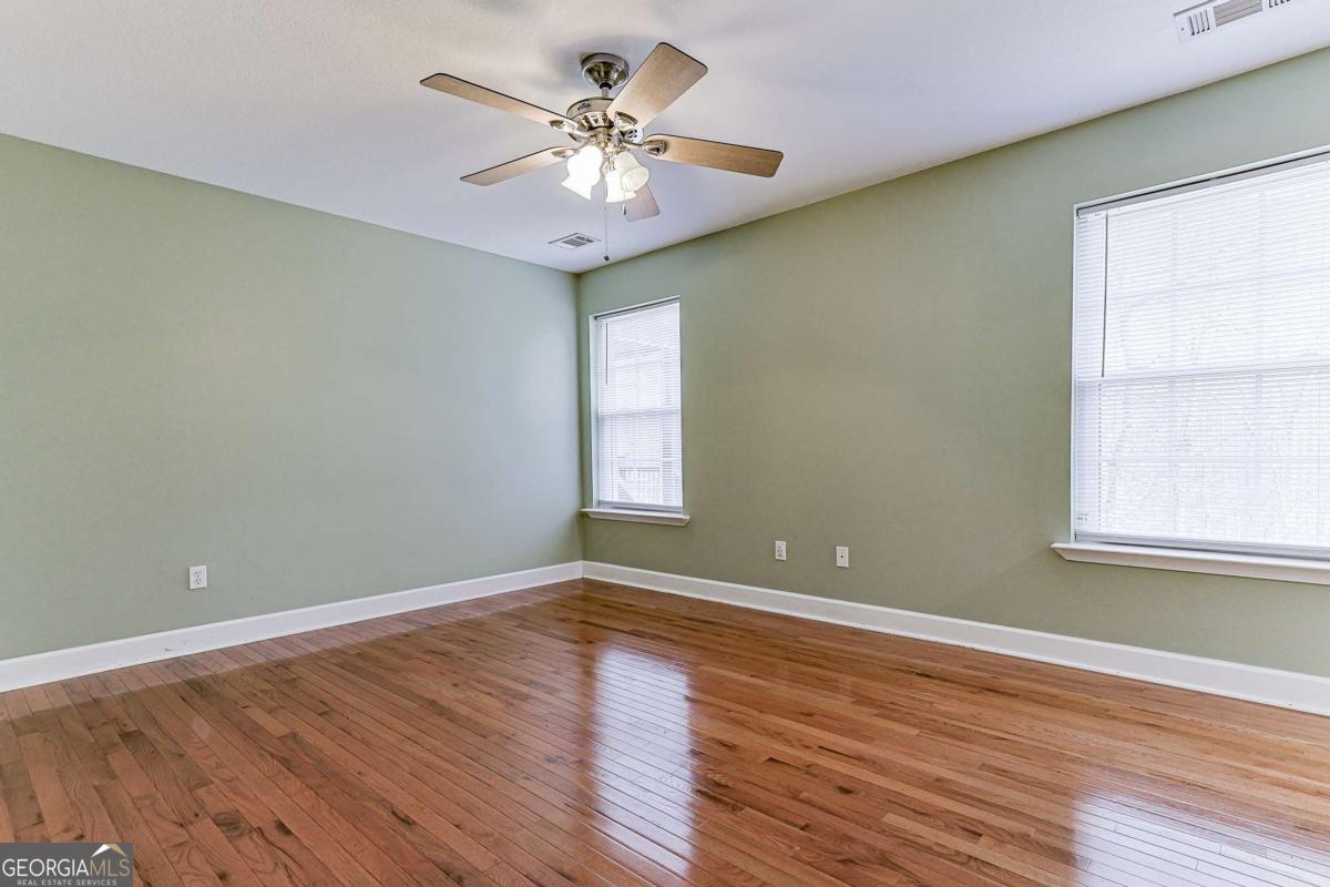 30 Chancel Circle, Unit 654R Ellijay, GA 30540 - Photo 33 of 44 a view of an empty room with wooden floor and a window