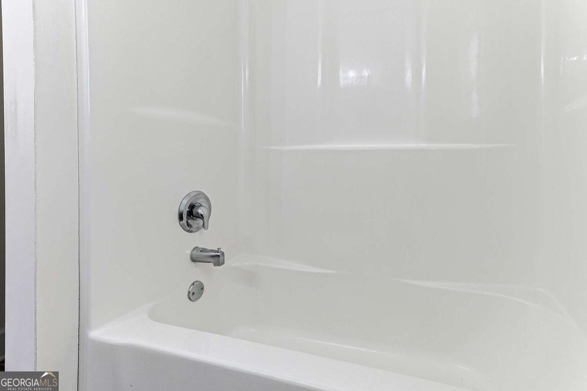 30 Chancel Circle, Unit 654R Ellijay, GA 30540 - Photo 36 of 44 a close up of a bathtub