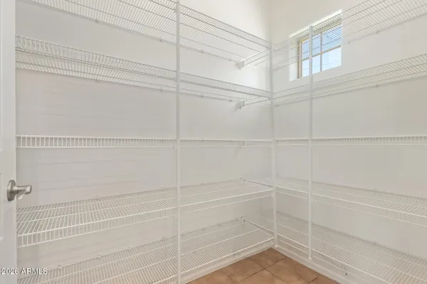 a view of hallway with wooden floor