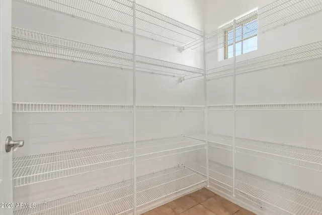 a view of hallway with wooden floor