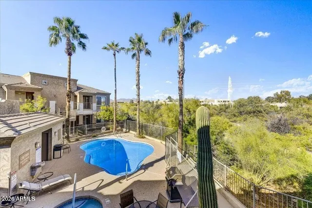 a view of balcony with furniture