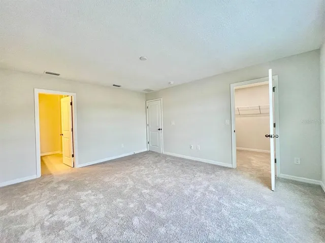 an empty room with a natural light