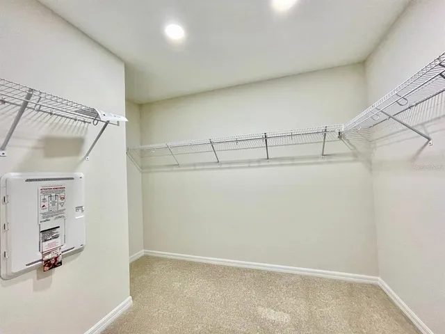 a view of a room with racks on the wall