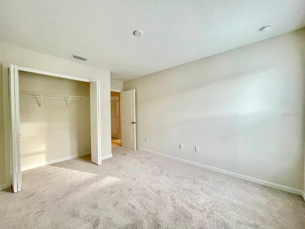 9689 Sweetwell Place Riverview, FL 33569 - Photo 22 of 33 a view of an empty room