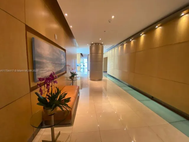 a view of a swimming pool with a lounge chairs