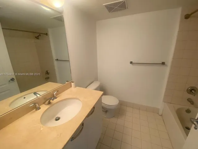 a bathroom with a sink and a tub