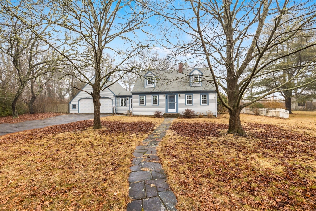 48 Murphy Road Hyannis, MA 02601 - Photo 1 of 31 a front view of a house with a yard