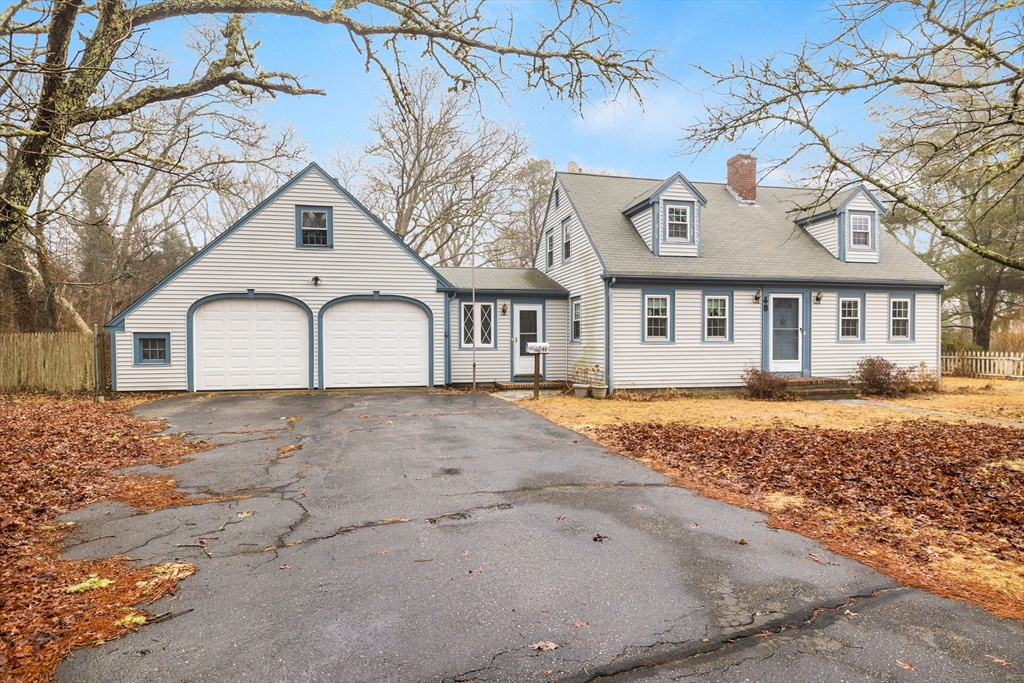 48 Murphy Road Hyannis, MA 02601 - Photo 2 of 31 a front view of a house with a yard