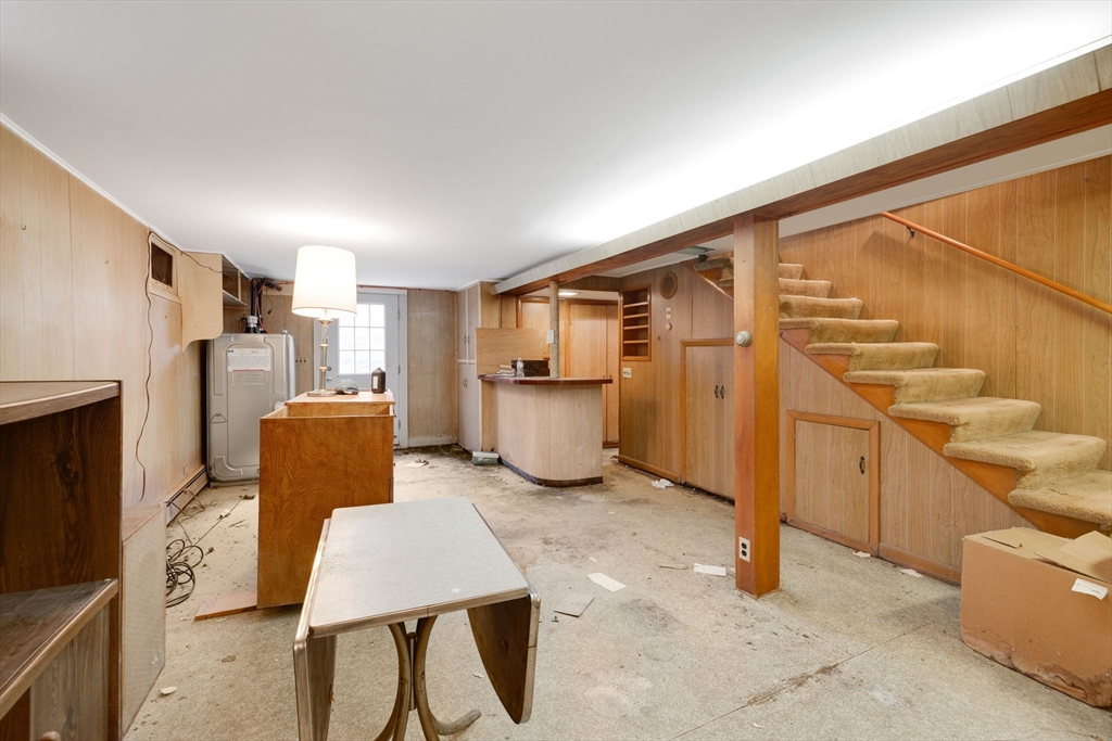 48 Murphy Road Hyannis, MA 02601 - Photo 25 of 31 a room with furniture a washer and dryer