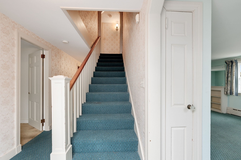 48 Murphy Road Hyannis, MA 02601 - Photo 3 of 31 a view of entryway with hallway and wooden floor