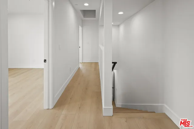 a view of hallway with stairs