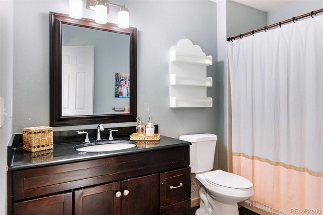 a living room with furniture and window