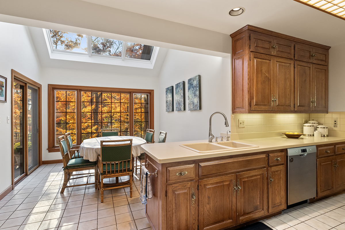 1931 Camphill Circle Inverness, IL 60067 - Photo 15 of 55 a view of a dining room with furniture window and outside view
