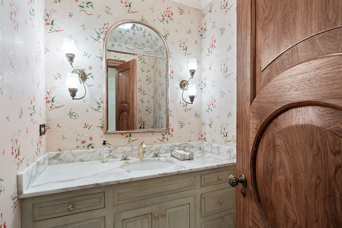 1931 Camphill Circle Inverness, IL 60067 - Photo 18 of 55 a bathroom with a sink and a mirror