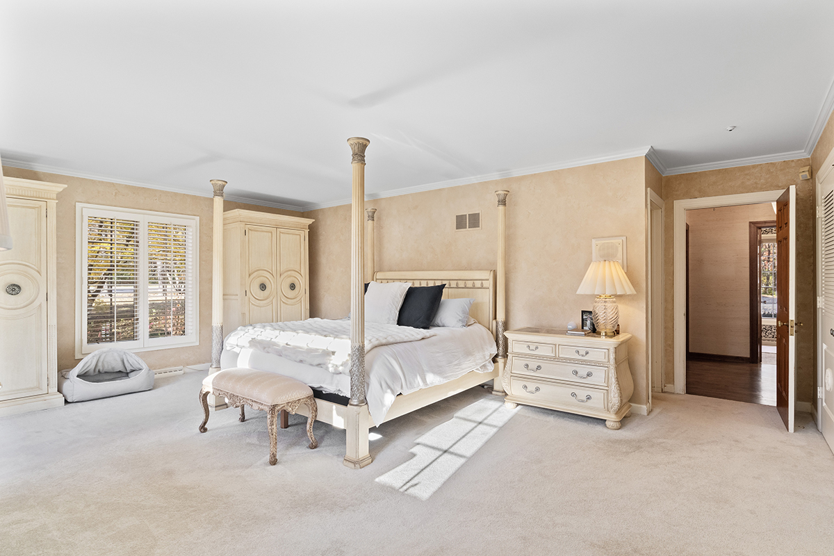 1931 Camphill Circle Inverness, IL 60067 - Photo 19 of 55 a bedroom with a bed and a couch