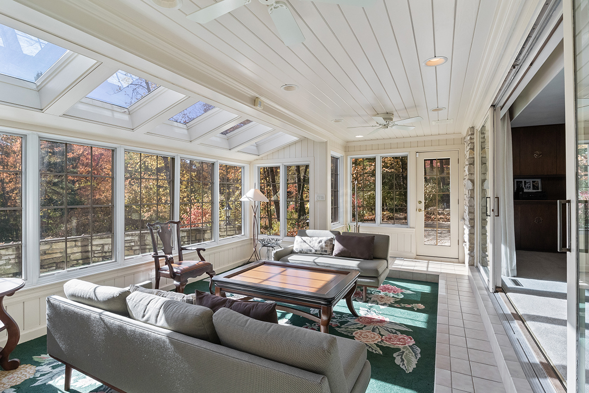 1931 Camphill Circle Inverness, IL 60067 - Photo 29 of 55 a living room with furniture and large windows