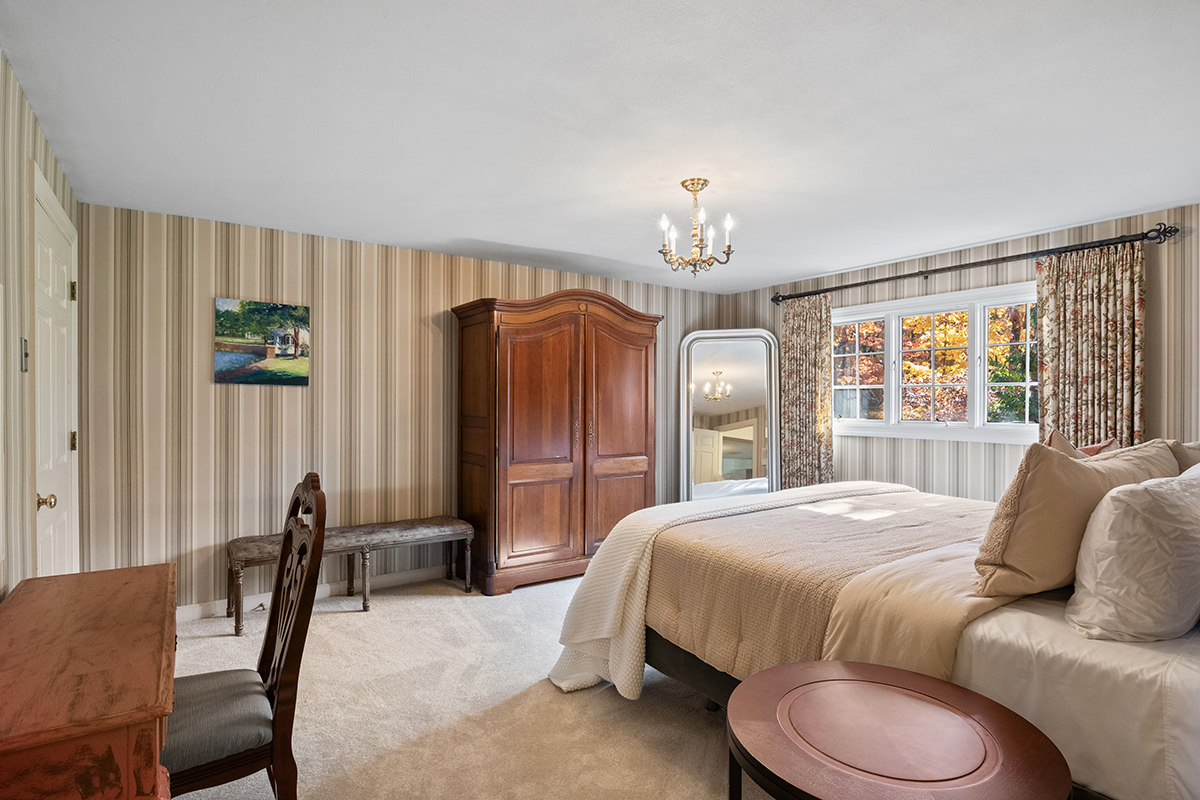 1931 Camphill Circle Inverness, IL 60067 - Photo 38 of 55 a bed room with a bed and a chair