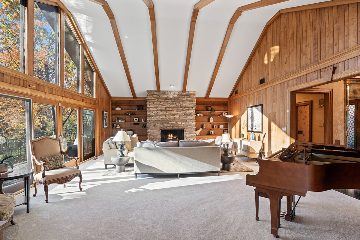 1931 Camphill Circle Inverness, IL 60067 - Photo 5 of 55 a living room with furniture a fireplace and large windows