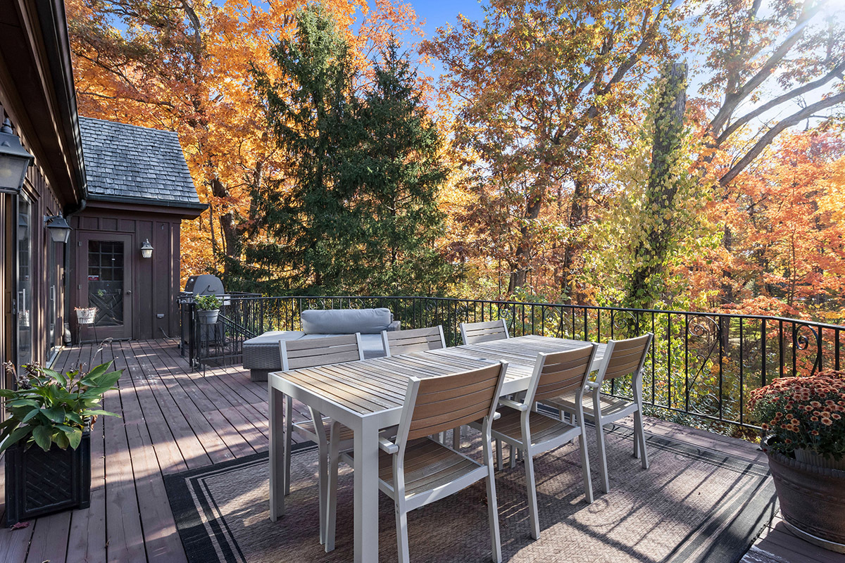 1931 Camphill Circle Inverness, IL 60067 - Photo 7 of 55 a view of a patio with a table and chairs next to a yard